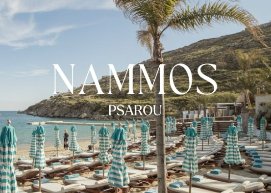 NAMMOS IN MYKONOS 2026 luxury beachfront restaurant and beach club with elegant sunbeds, crystal-clear turquoise sea, champagne service, luxury yachts, designer fashion atmosphere, and exclusive VIP summer lifestyle in Greece.