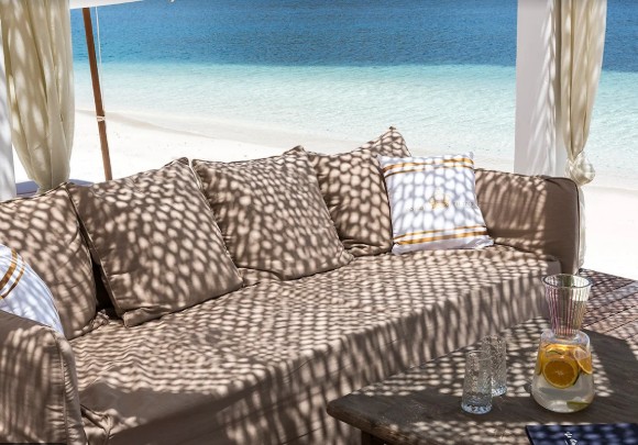 D Maris Bay luxury resort surrounded by turquoise sea, private beaches, pine-covered mountains, and exclusive villas on the Datça Peninsula in Turkey.